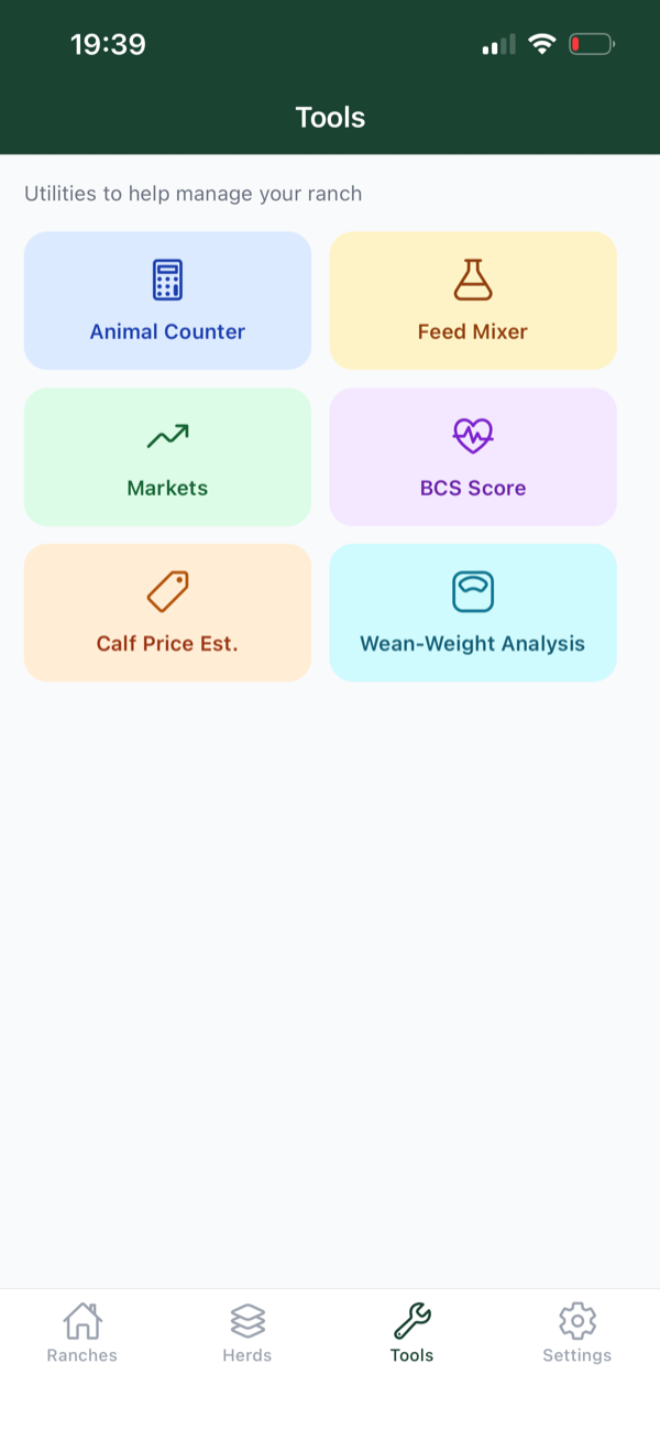 Tools screen with animal counter, feed mixer, markets, BCS score, calf price, and wean-weight analysis